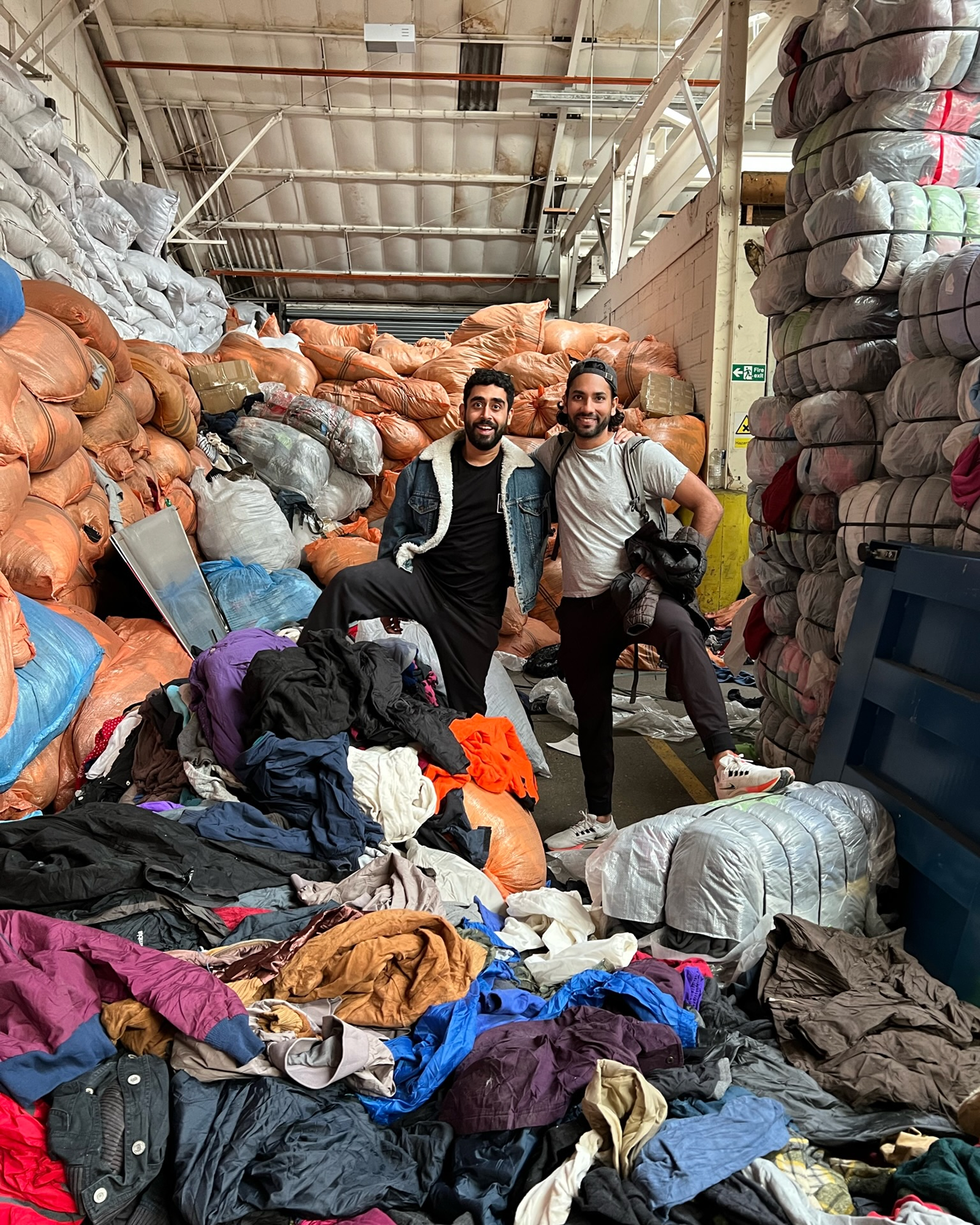 Fleek stock source showing South Asian wholesale clothing processing and sorting facilities