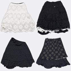 Jupe midi à volants et broderie anglaise noire et ..