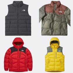 Le lot de doudounes et vestes remplies de duvet Th..