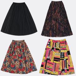 Jupes mi-longues à motifs floraux vintage et à imp..