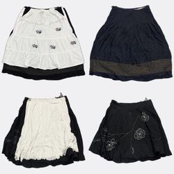 Gonne in cotone ricamate nero e biancoGonne con vo..