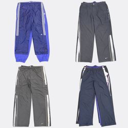Pantaloni da tracciamento Nike adidas