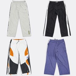 Pantaloni da allenamento Nike Adidas