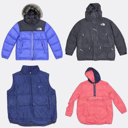 Les doudounes The North Face Nike