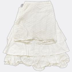 Jupes mi-longues blanches à volants